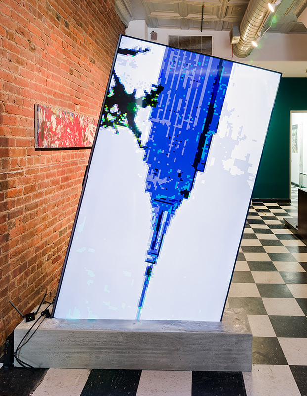 Device to Root Out Evil 2025 | custom software output to 85” display, cast concrete 60 x 10 x 80 in Device to Root Out Evil